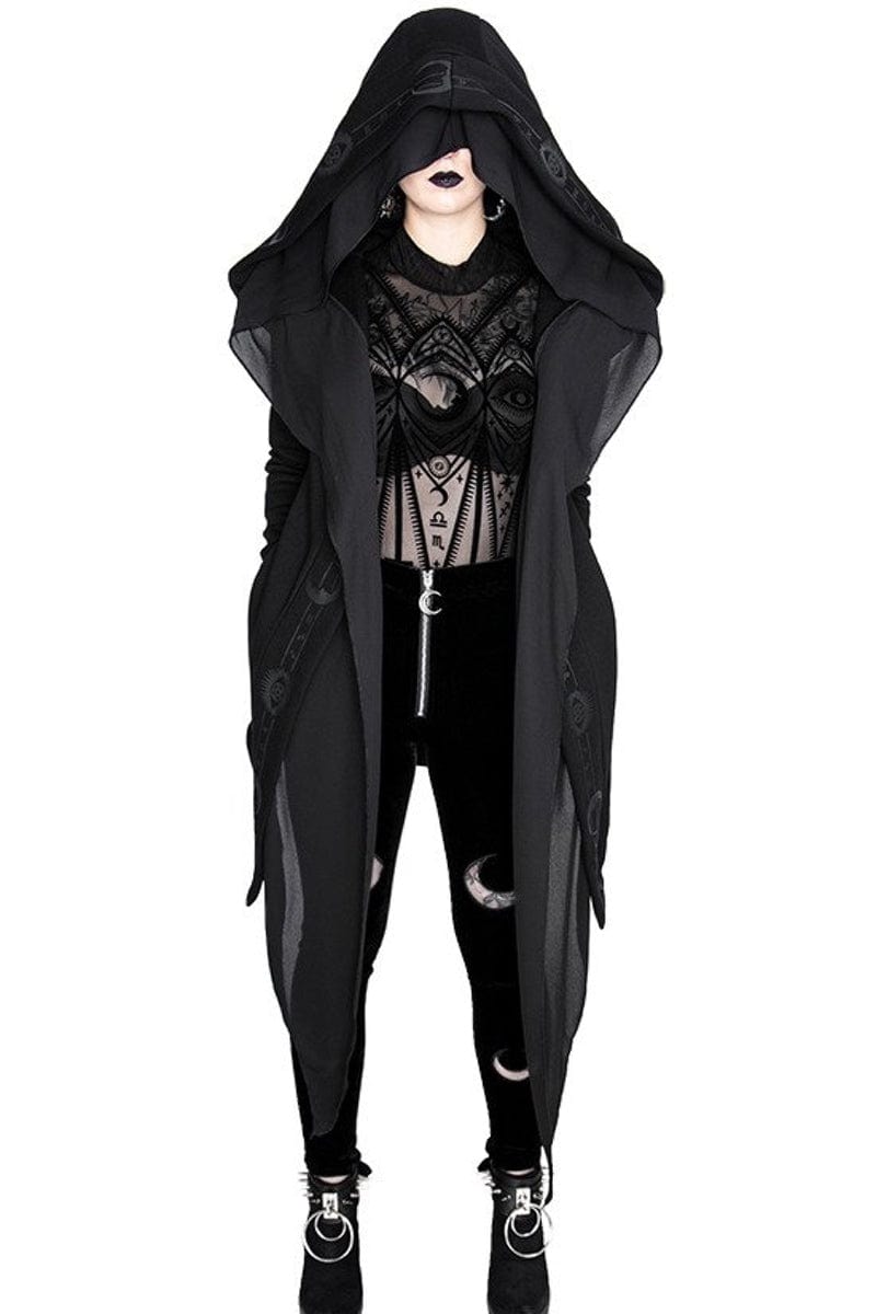 modern forest witch in the black gothic pagan witch hoodie with moon symbols and oversized hood