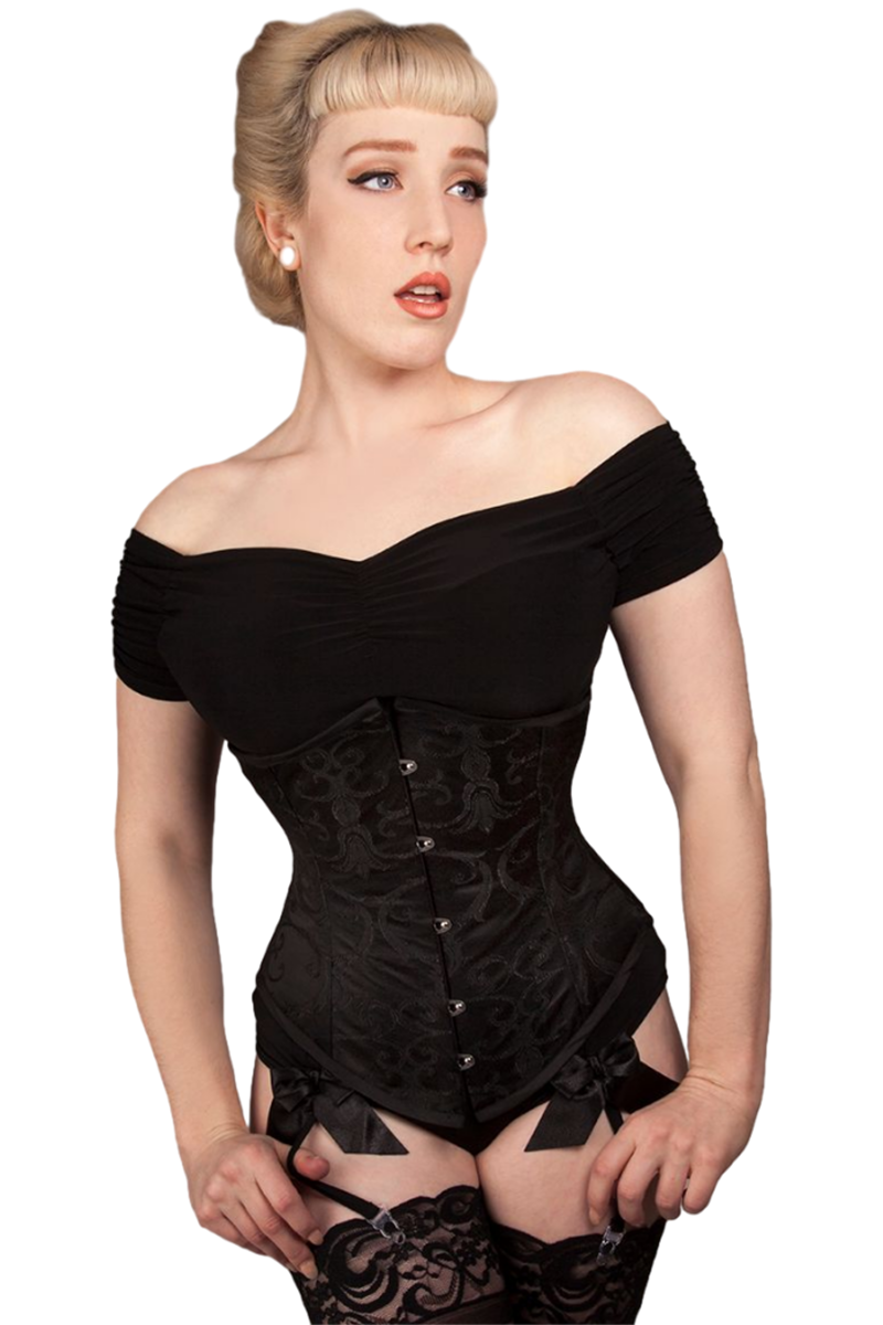 Woman wearing a black corset on a white background