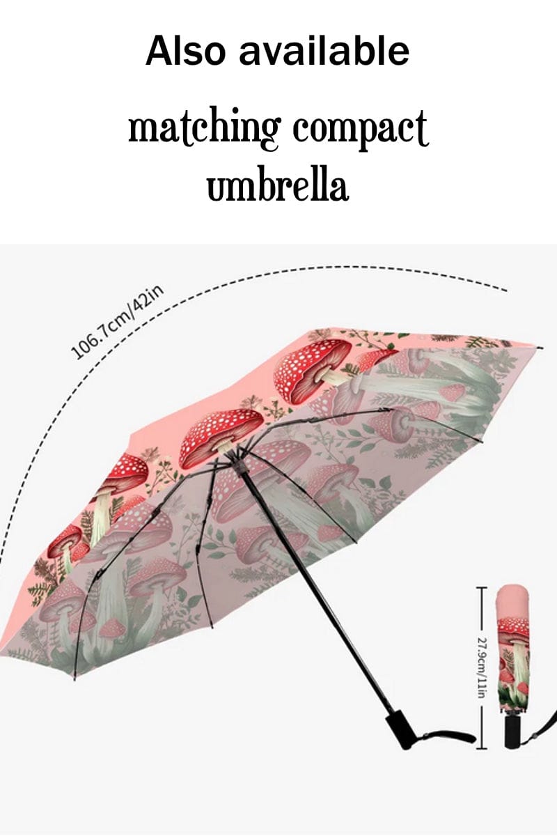 compact cottagecore, mushroomcore umbrella featuring red toadstools