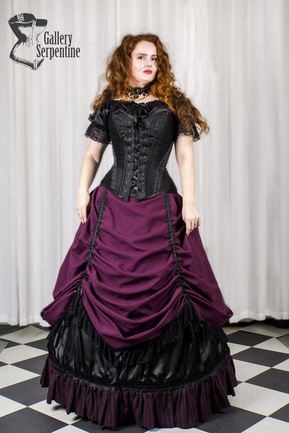 model wearing the new Turn of the Century steel boned corset with a neo victorian skirt set in burgundy