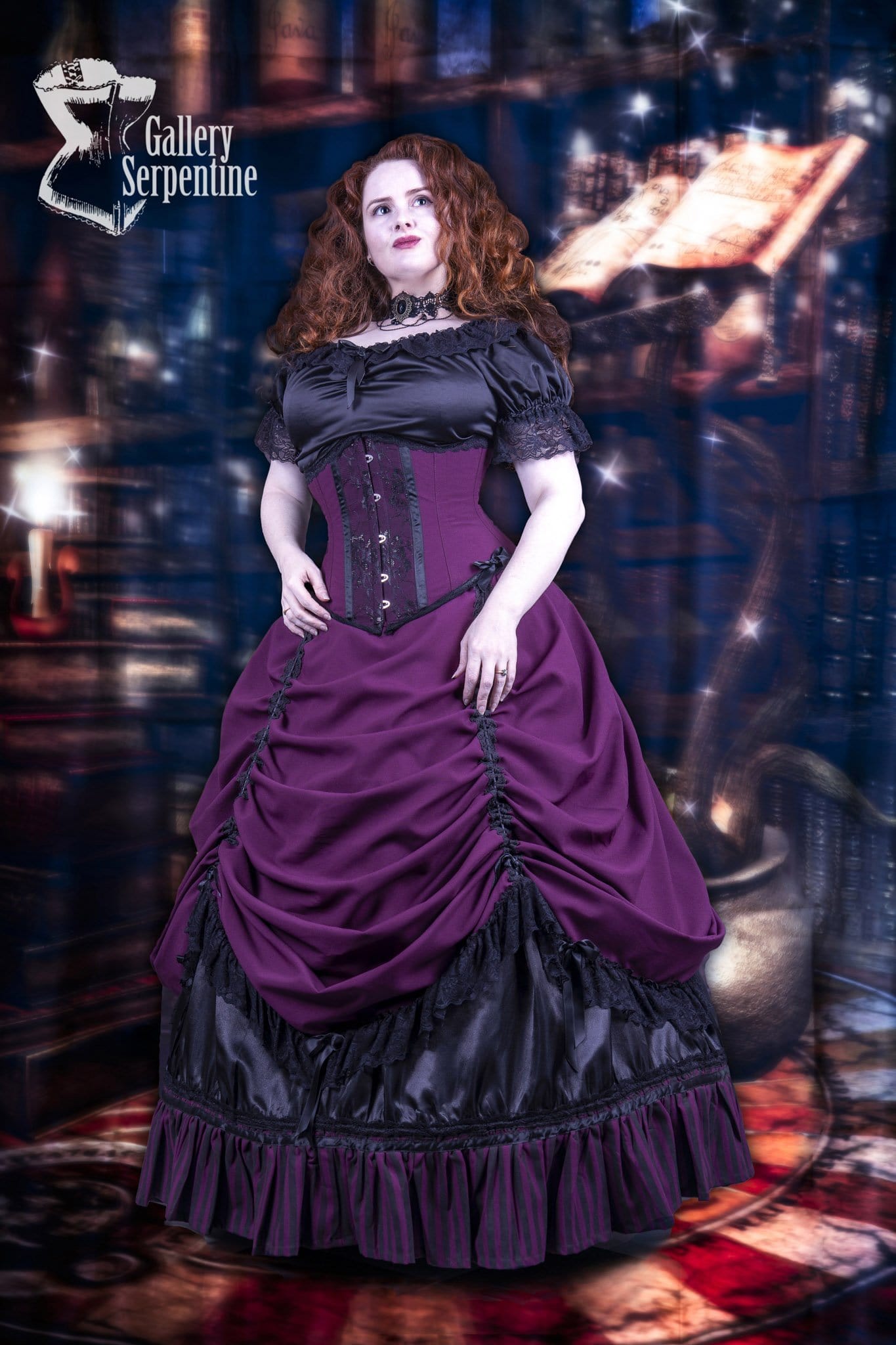 model wearing the full victorian corset gown called Burgundy Beauty including the black satin Alice in Wonderland Chemise