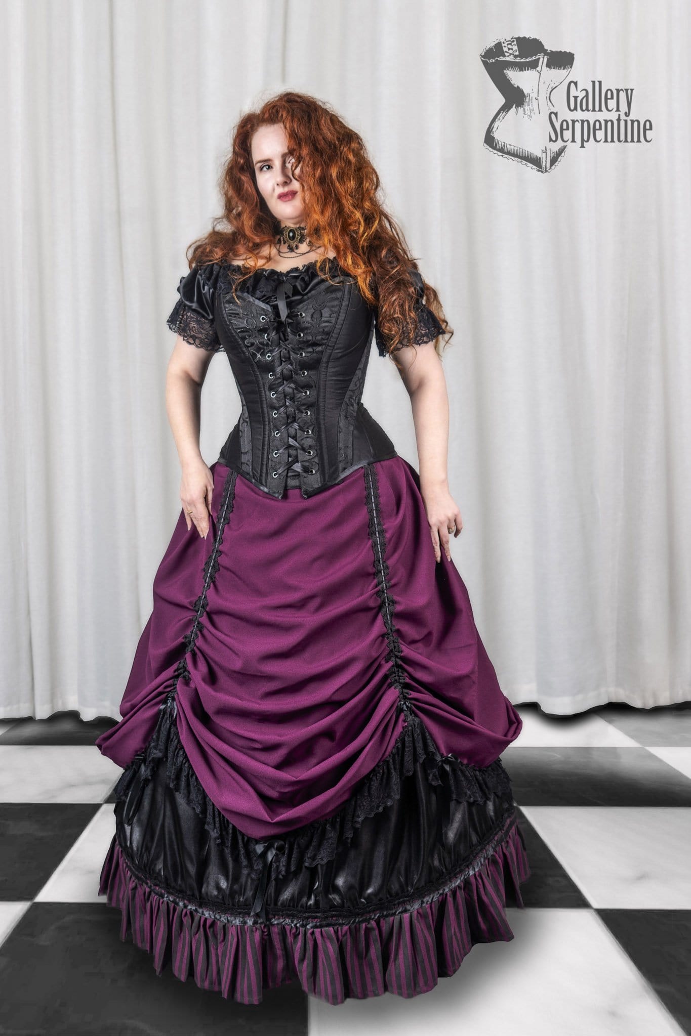 Victorian silhouette on a full figured model showing how to wear the Burgundy Beauty skirt set and the over bust corset with it