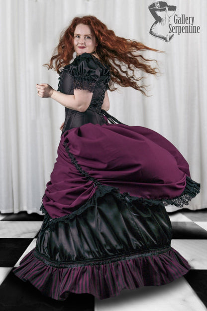 burgundy beauty skirt set in flowing action on a red headed model
