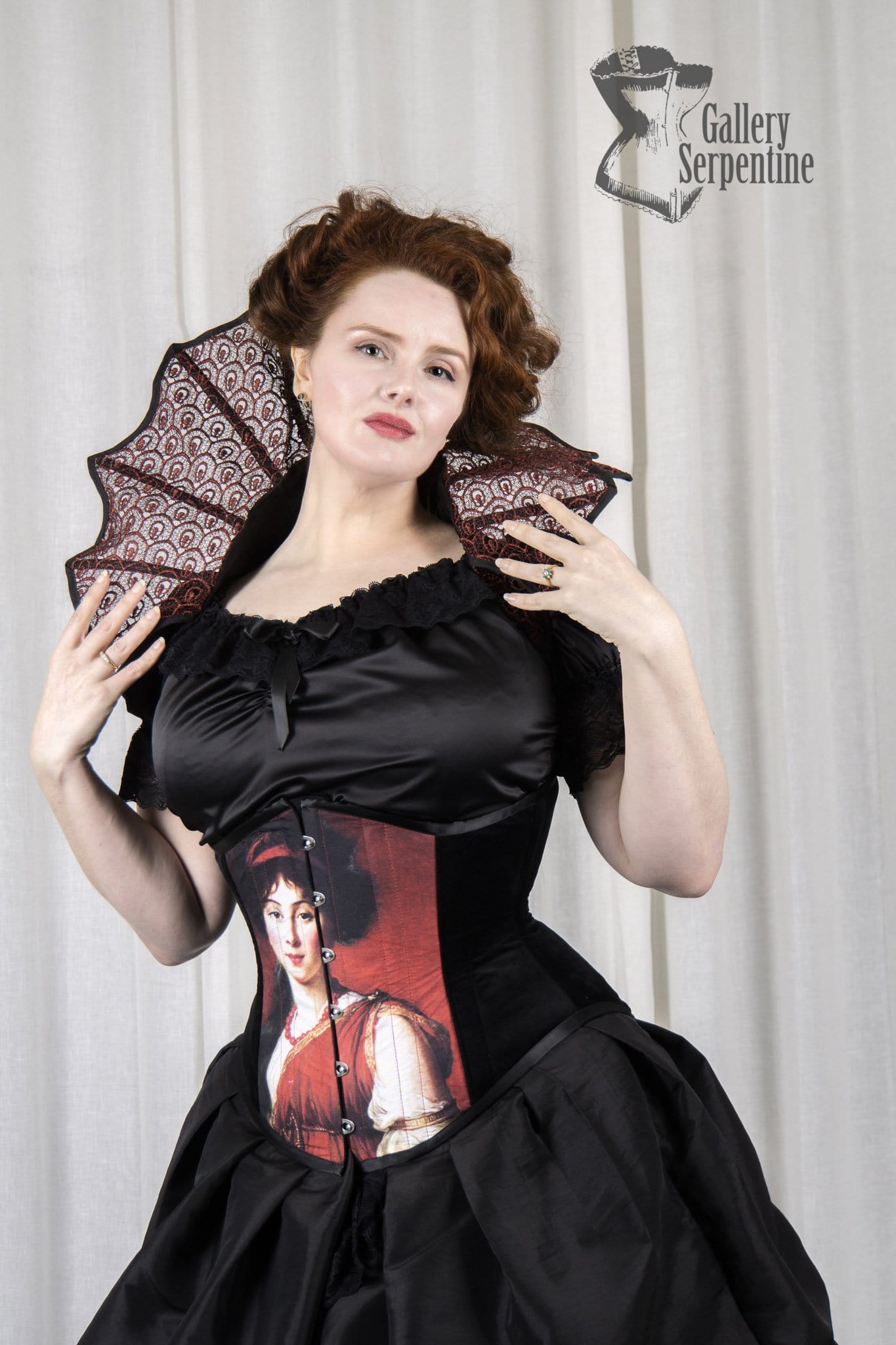 Pre raphaelite artwork on a steel boned under bust corset worn on a red headed model