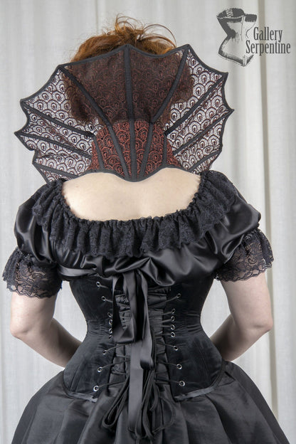 back view of the Pre raphaelite artwork on a steel boned under bust corset worn on a red headed model