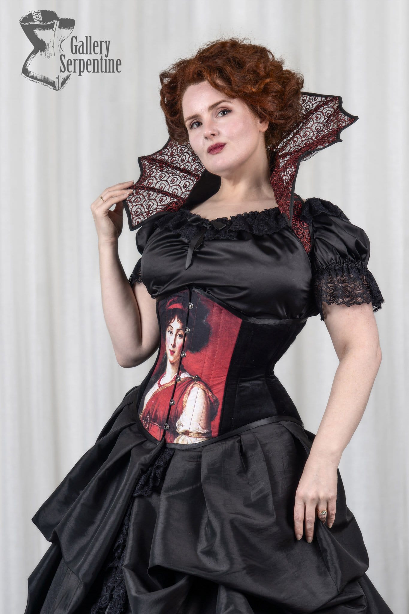 Pre raphaelite artwork on a steel boned under bust corset worn on a red headed model in cosplay costume