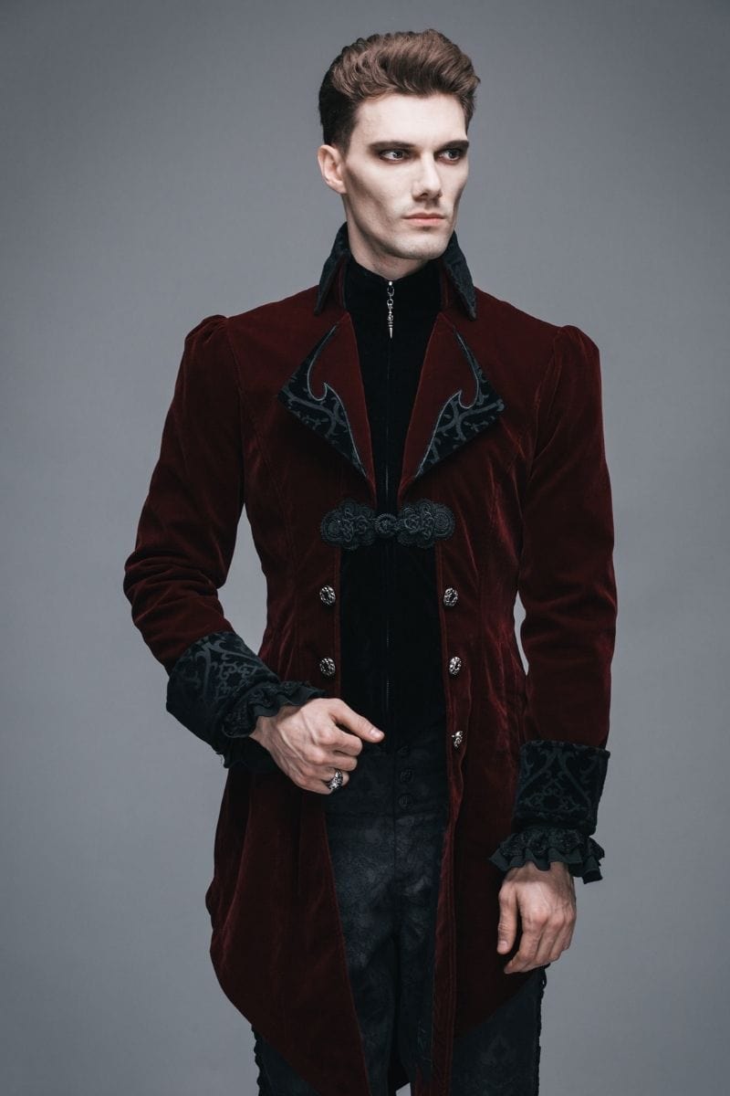 male model wearing the gorgeous gothic victorian dark red velvet men's tail coat for weddings, formals, cosplay, victorian costumes