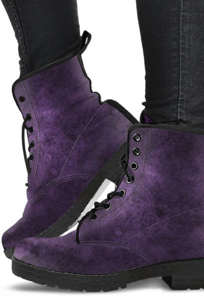 legs of a goth musician in the gothic purple men's vegan leather boots