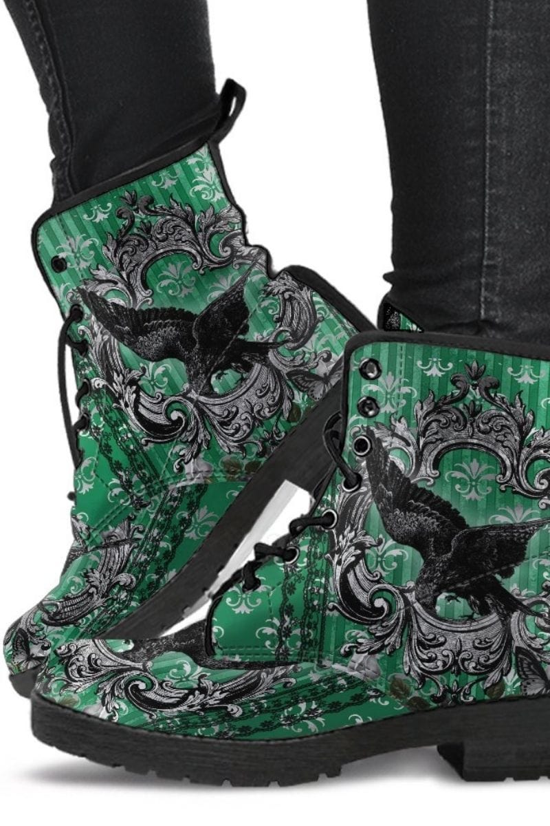 gothic raven in green background on pair of vegan leather boots