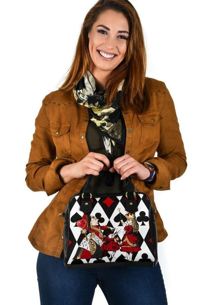 woman holding a gift of the Queen of Hearts Alice in Wonderland handbag