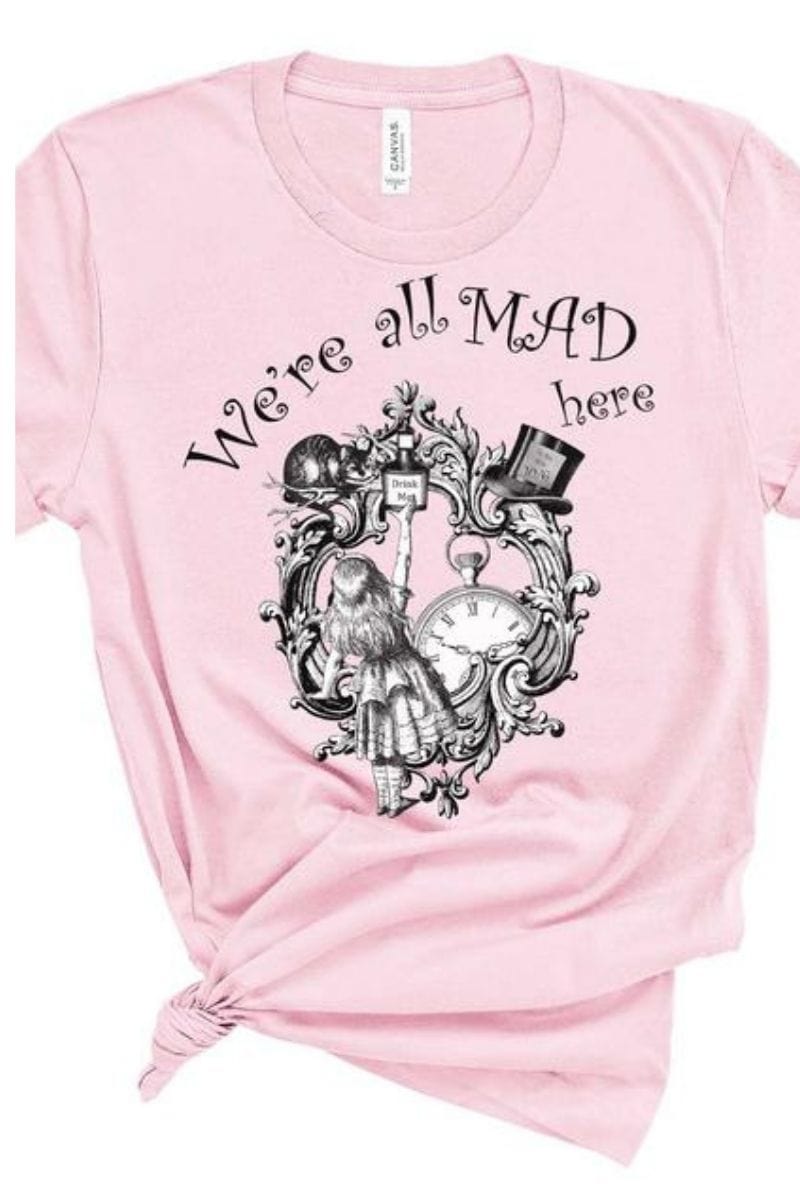 We're All Mad Here quote t-shirt from Alice in Wonderland on soft pink t-shirt