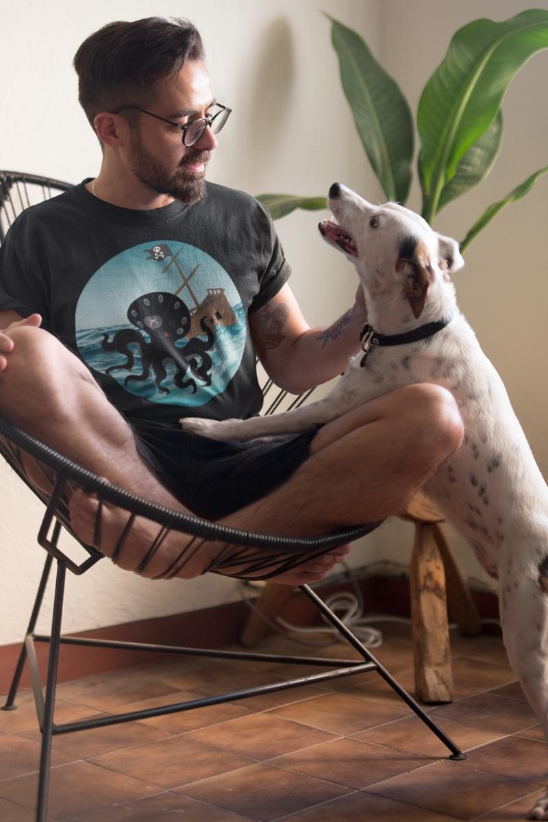 man and his dog wearing the Happy Kraken men's pirate themed t-shirt for Father's Day