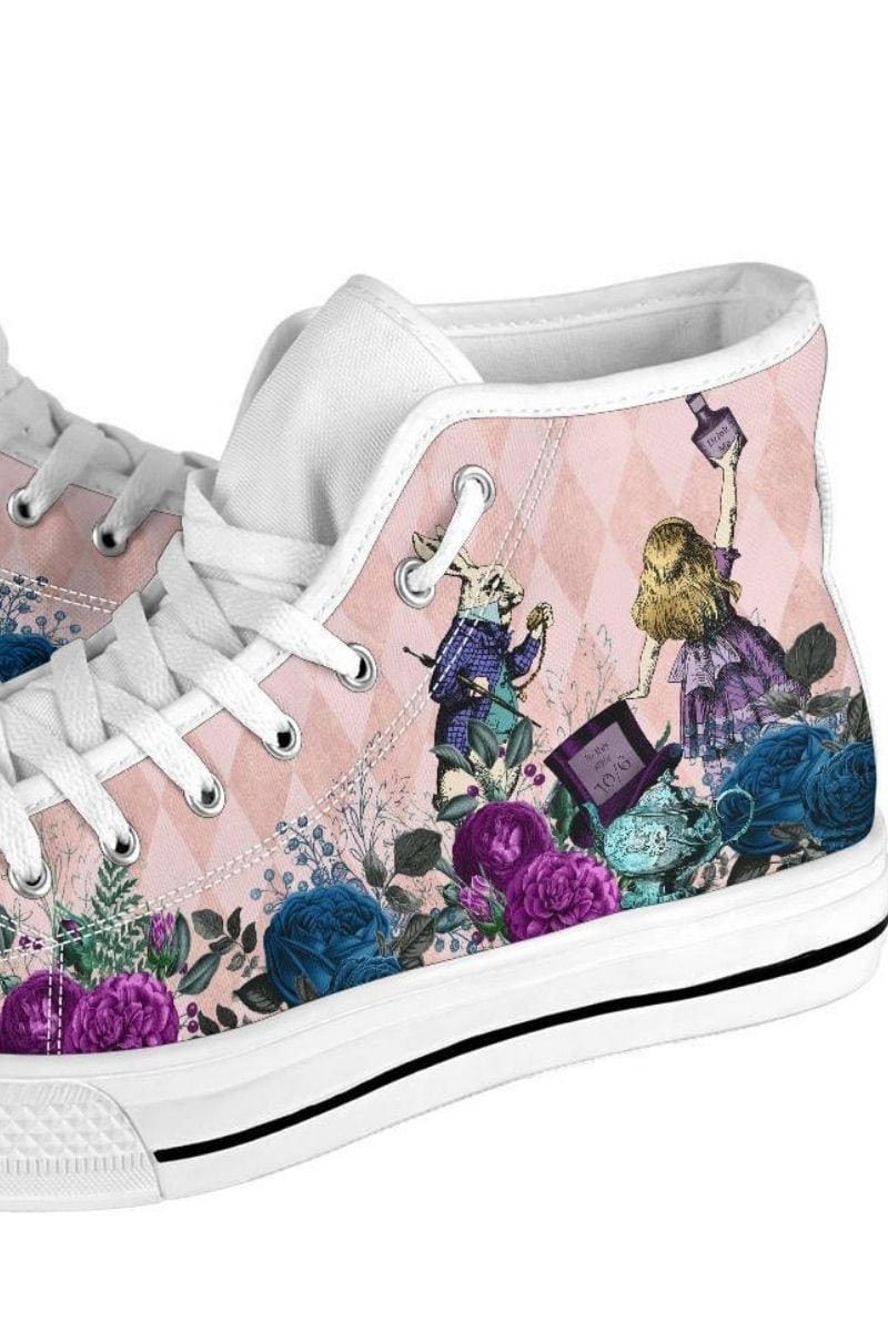 close up on the print featuring the White Rabbit on the Soft pink Alice in Wonderland high top sneakers