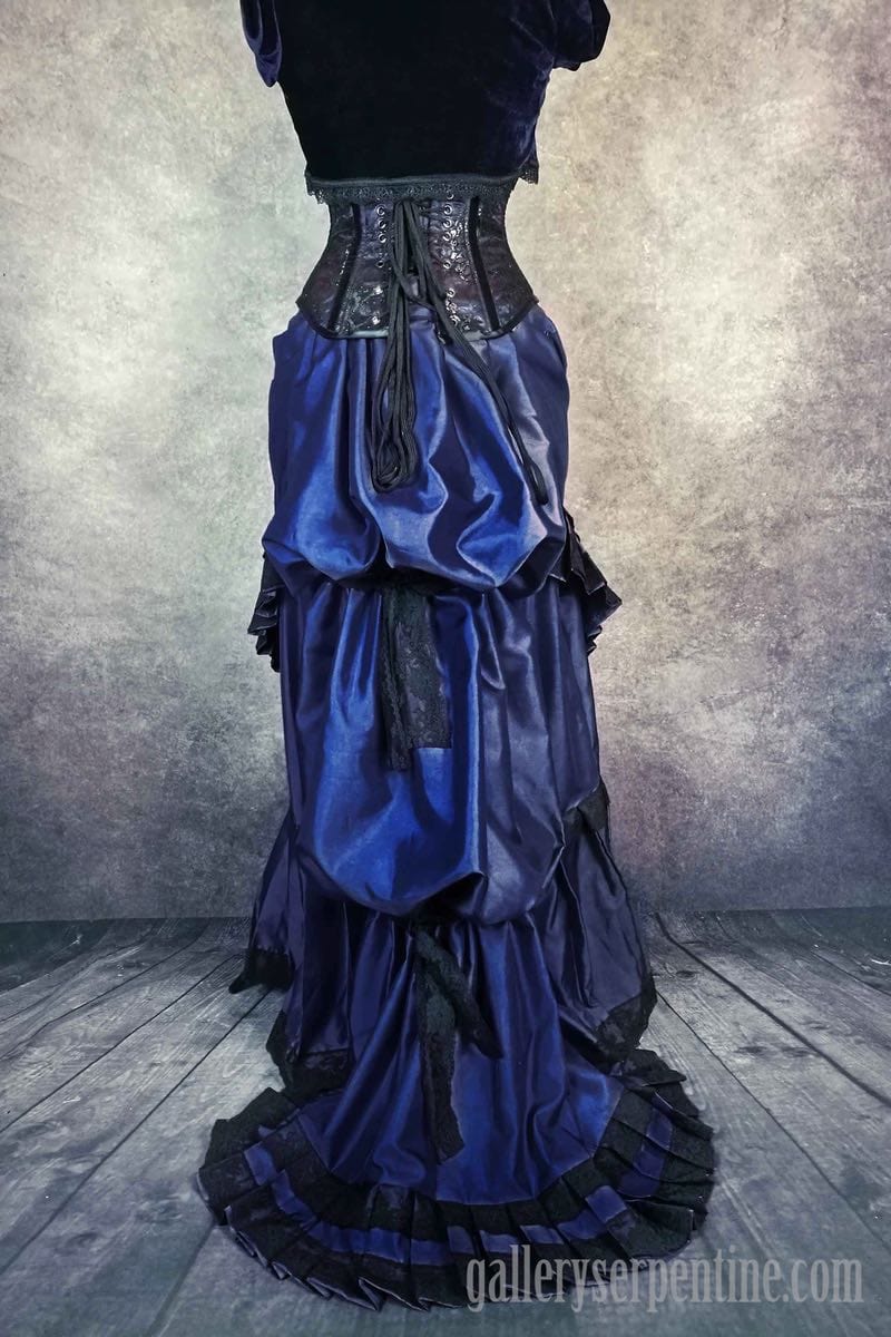 deepest blue victorian bustle skirt 1880s victorian wedding dress showing back bustle view with a corset