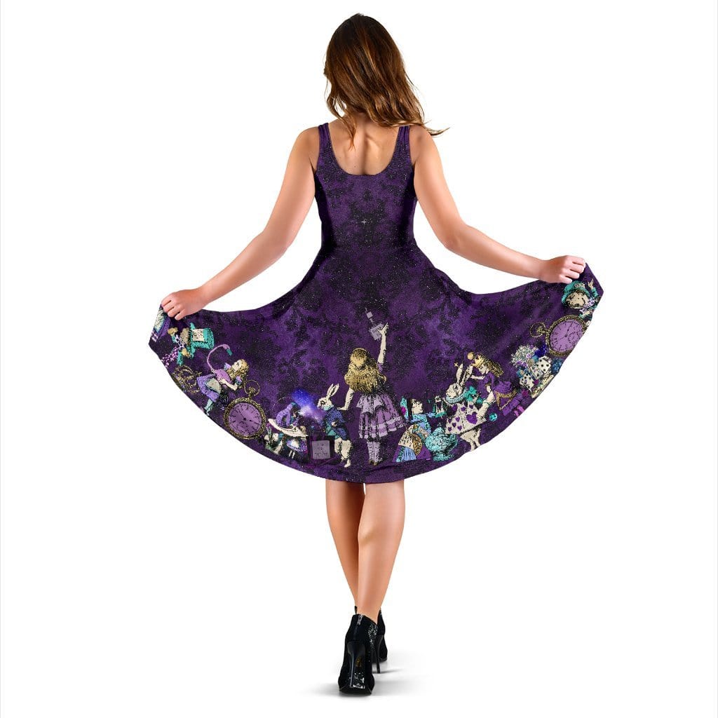 model showing the full width of the print on the dark purple gothic themed Alice in Wonderland mid length sleeveless dress