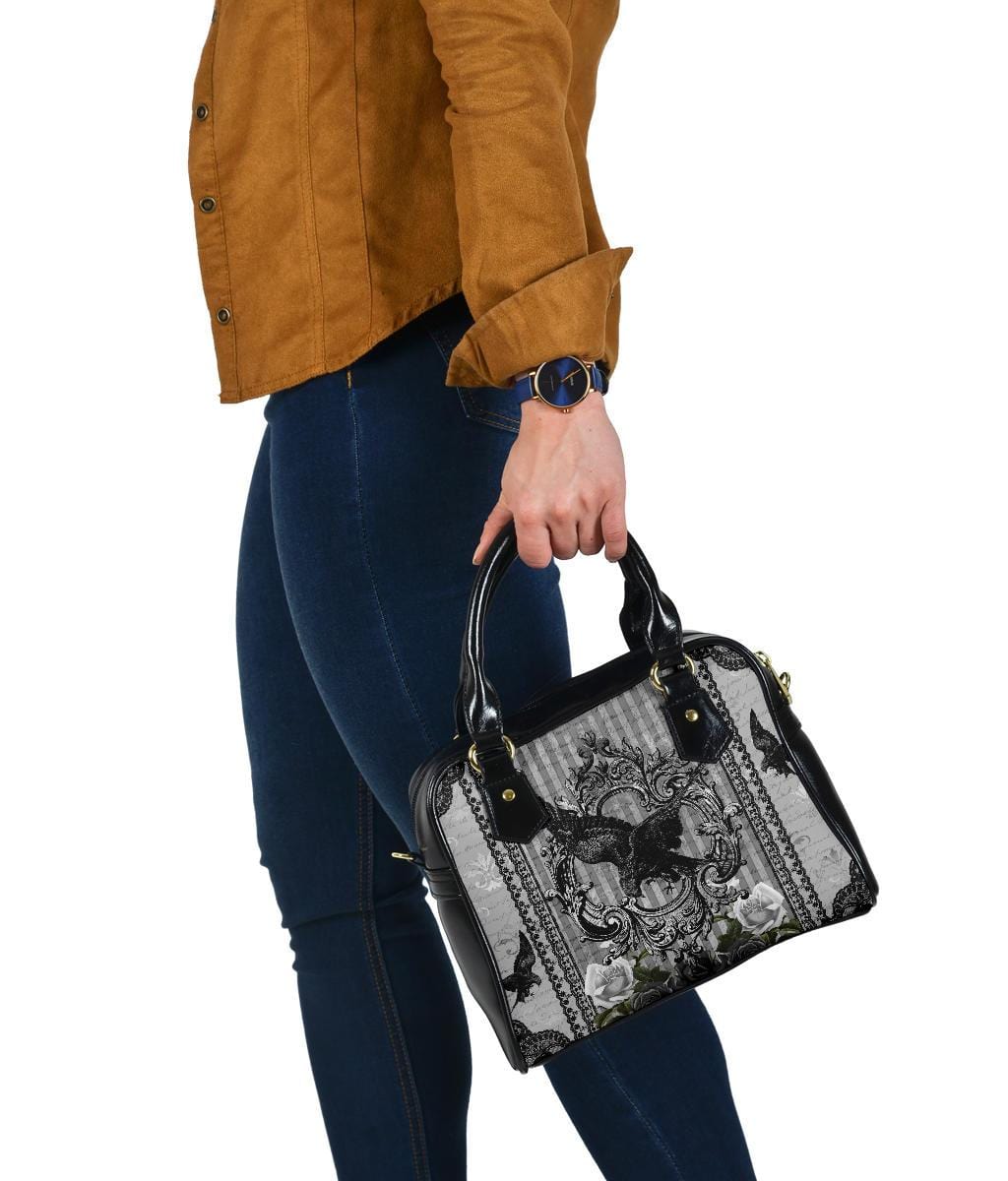 woman carrying the Raven Gothic printed PU leather handbag
