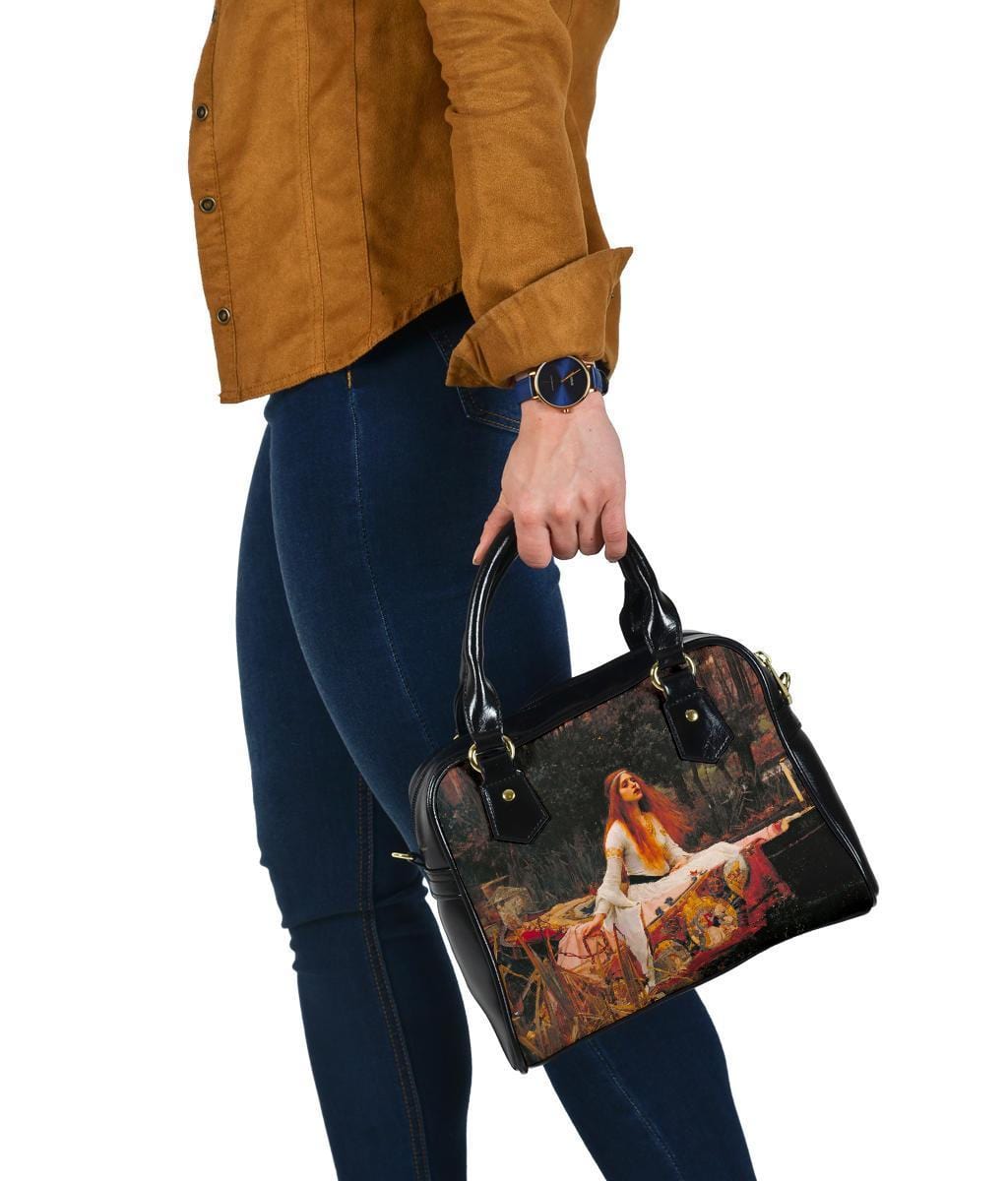 woman wearing blue jeans carrying the Lady of Shalott handbag