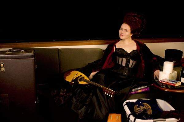 mandolin player and corset model Elizabeth Smyth in the new Gallery Serpentine black mesh waist training corset