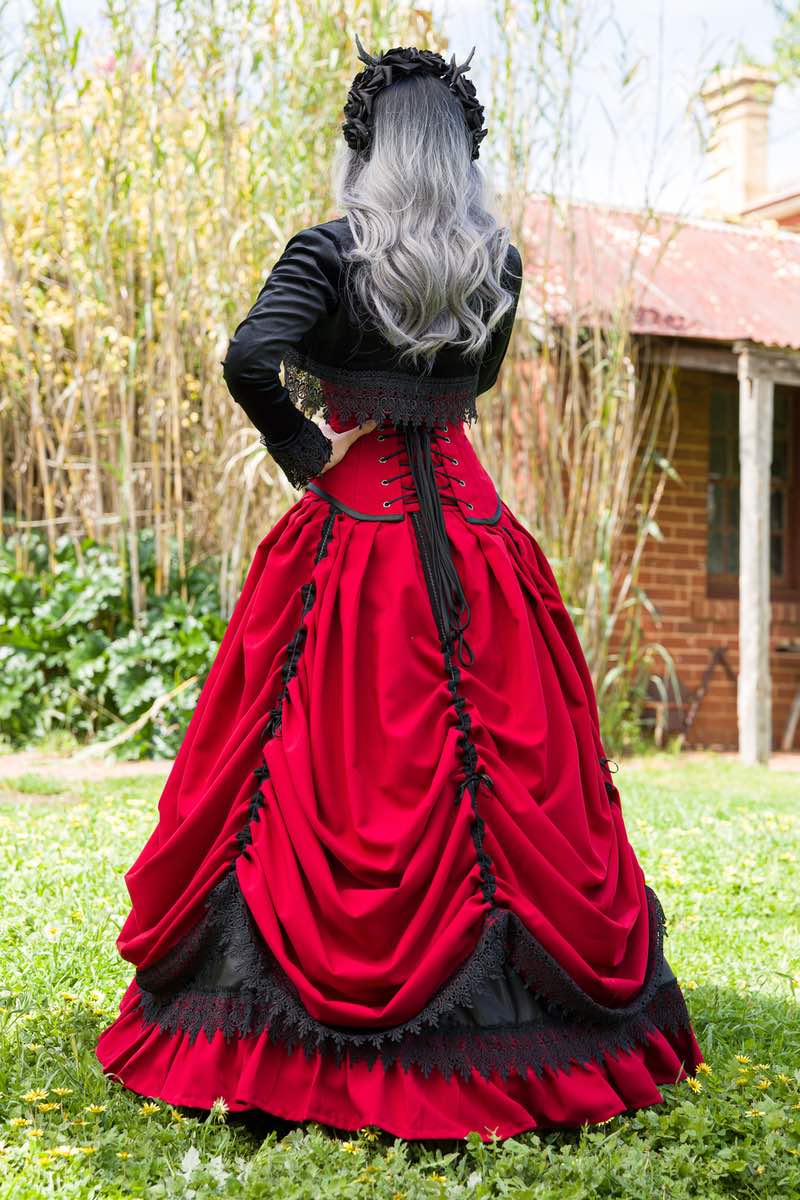 back view of gothic victorian red and black corset wedding gown Gallery Serpentine
