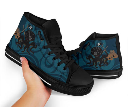 hand holding the Pirate Kraken print with turquoise blue stylised waves on a women's canvas sneaker