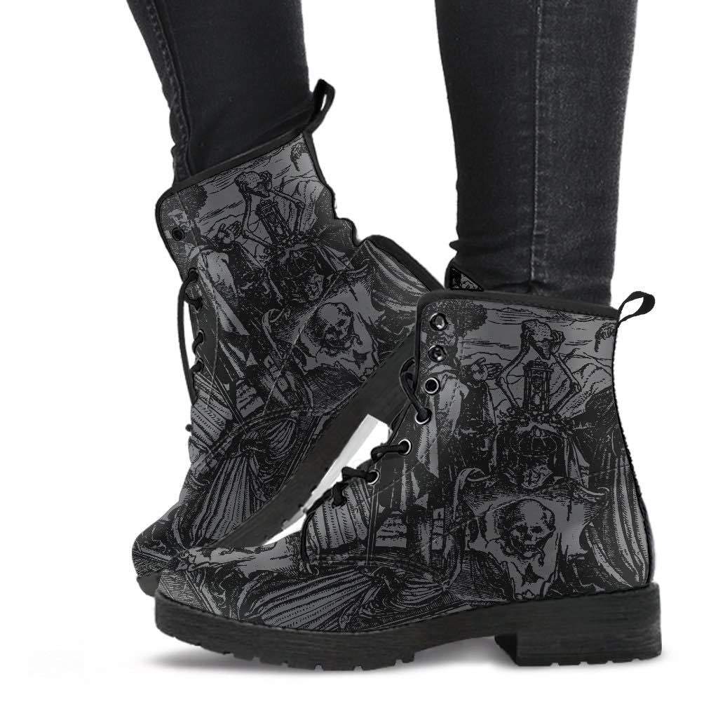 goth woman wearing the Holbein's Dance of Death wood cut on women's vegan leather boots
