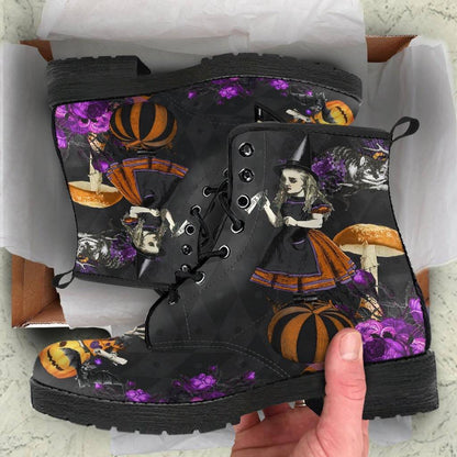woman receiving the Alice in Wonderland Halloween themed boots as a birthday present