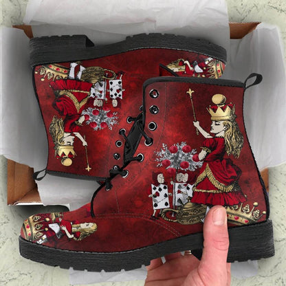 unwrapping the Christmas present of the red themed Alice in Wonderland boots