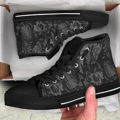 man receiving the men's grey black high top canvas sneakers with Holbein woodcut Dance of Death as a gothic Christmas present