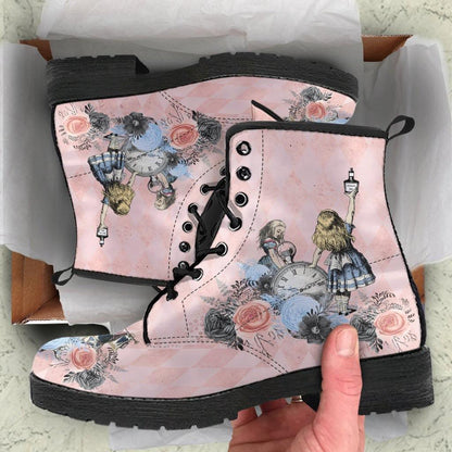 unboxing picture of the Alice in Wonderland cute printed vegan boots on Gallery Serpentine website