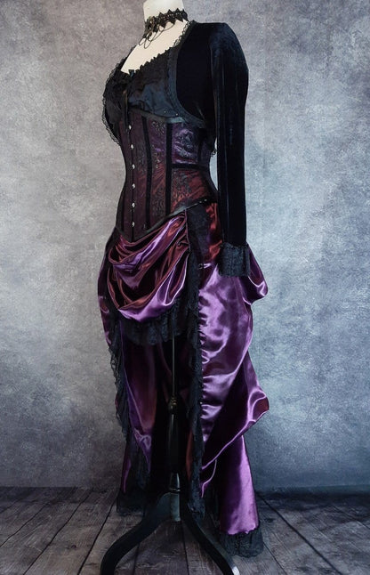 side front view of the amethyst satin victorian bustle skirt on a mannequin with matching amethyst beauty corset