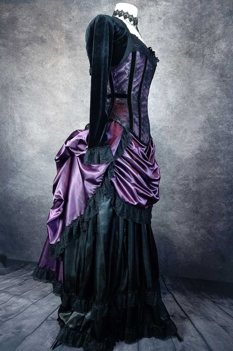 side front view of the flattering and slimming amethyst pandora over bust corset shown worn with a cage bustle