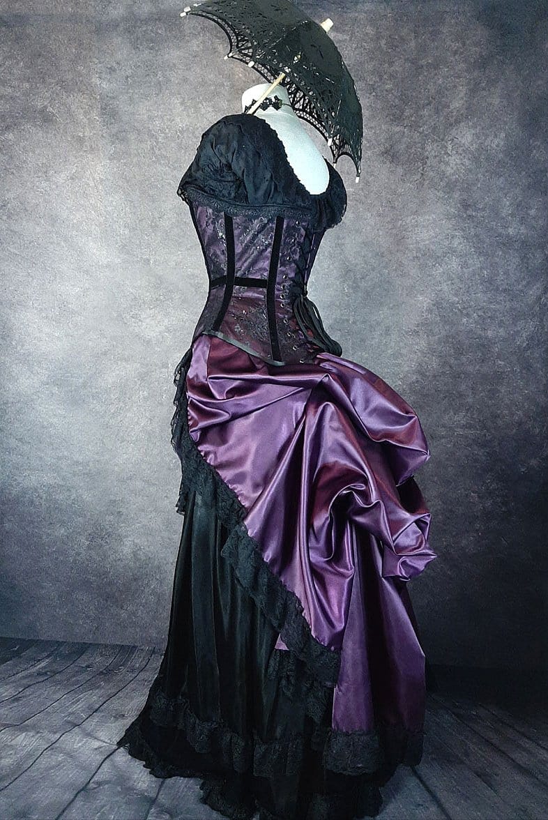 full view showing the shape of the back of the corset as it sits over the Deluxe Victorian Bustle skirt in a matching amethyst satin