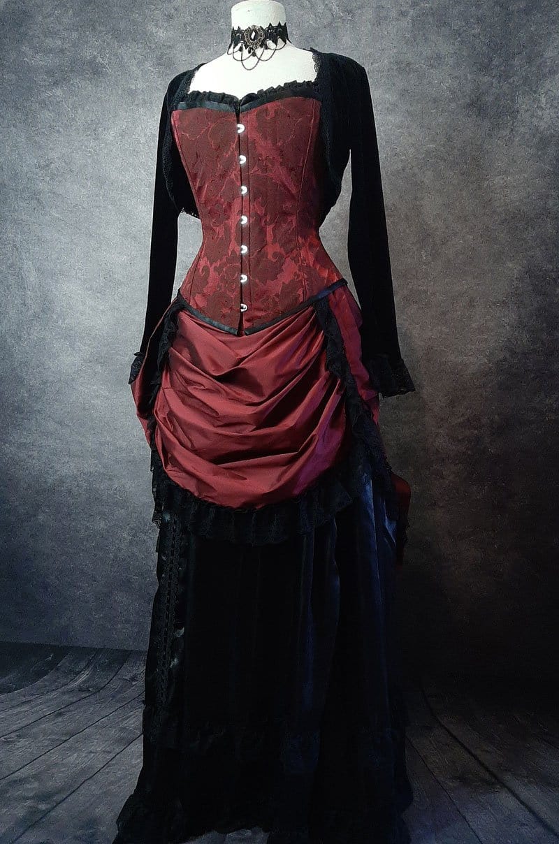 front view of the new deluxe length garnet victorian bustle skirt shown here with a garnet brocade over bust corset