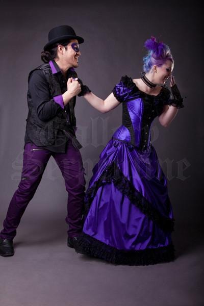 Purple Joker character and gothic model wearing the Amethyst Turn of the Century Corset steel boned, purple and black baroque patterned jacquard, made in Australia by Gallery Serpentine