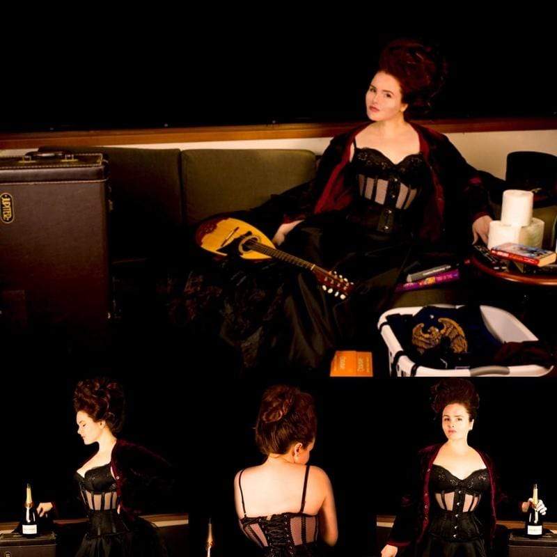 new dark desire black mesh corset worn by corset model Elizabeth Smyth during a quarantine photo shoot