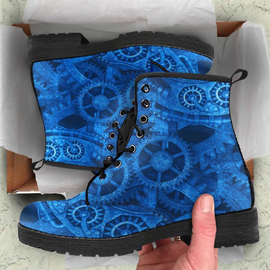 man unboxing gift of the vegan bright blue steampunk boots for men