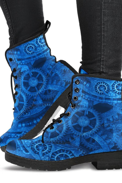 woman walking in the bright blue steampunk vegan boots