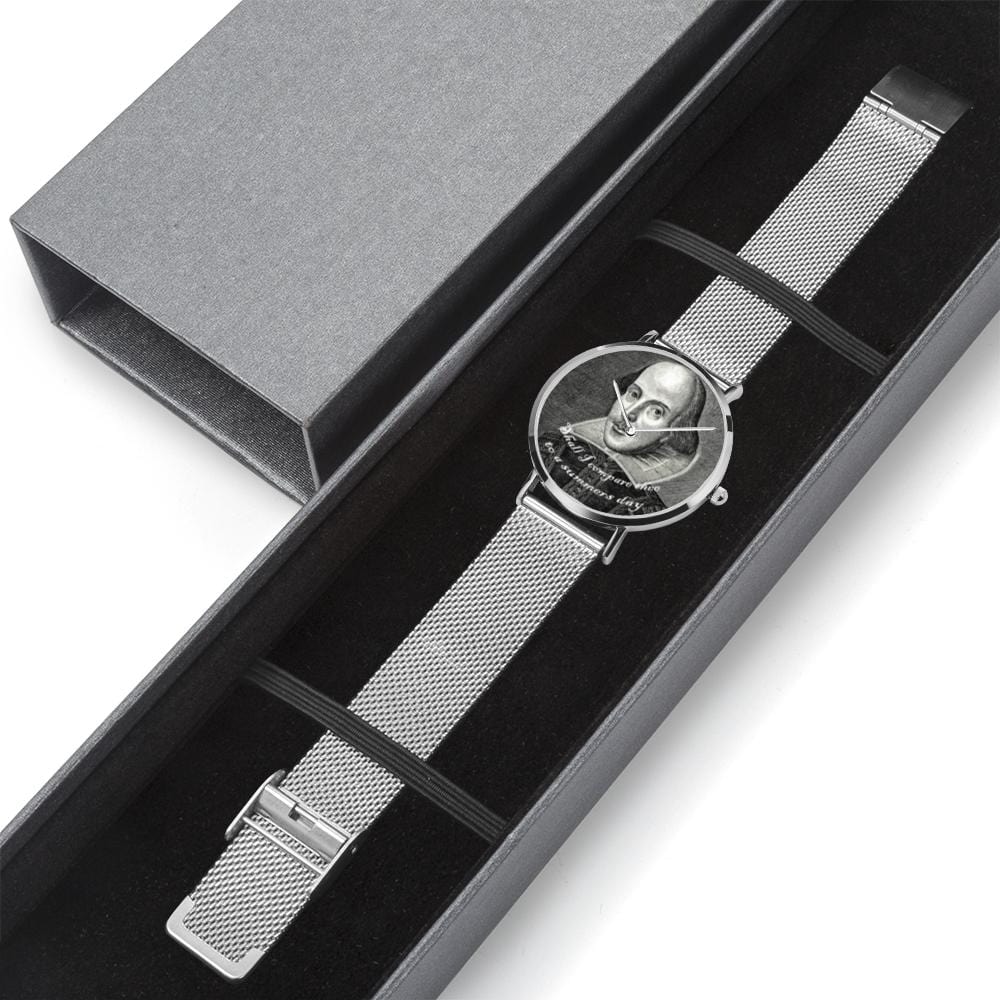 silver version of the Shakespeare watch laid out in a silver and black gift box