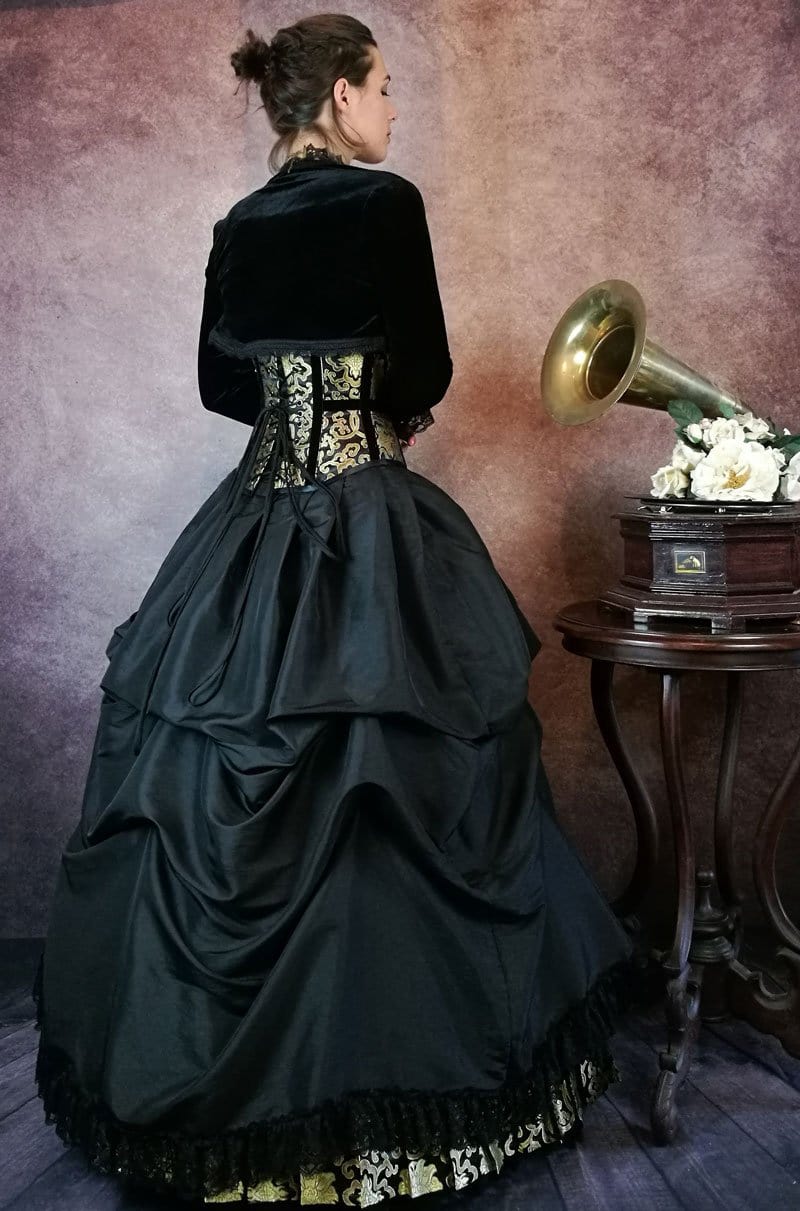 victorian style setting withe gramophone with model wearing the Golden Majestica skirt set back view