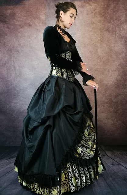 side view of the gold and black ballgown 