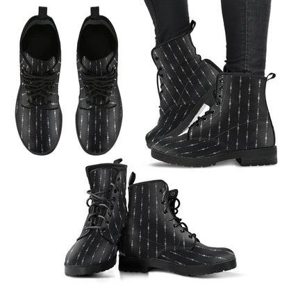 multiple views of the gothic pinstripe pattern on a pair of black vegan leather boots at Gallery Serpentine