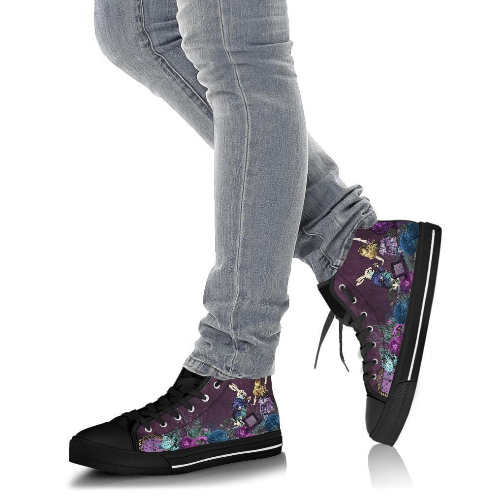 purple Alice in Wonderland hi top sneakers at Gallery Serpentine shown on a pair of legs