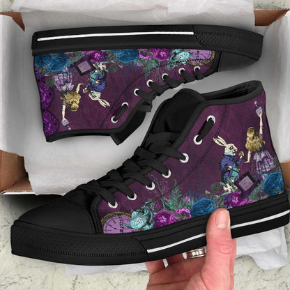 showing the unboxing of the purple Alice in Wonderland hi top sneakers at Gallery Serpentine