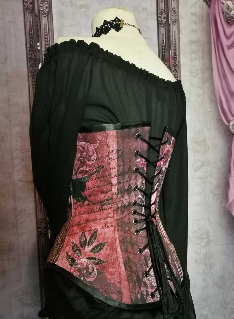 close up view of the back of the custom made fabric in Australian made Gallery Serpentine Gothic Memento burgundy dusky pink peach toned steel boned corset made to measure