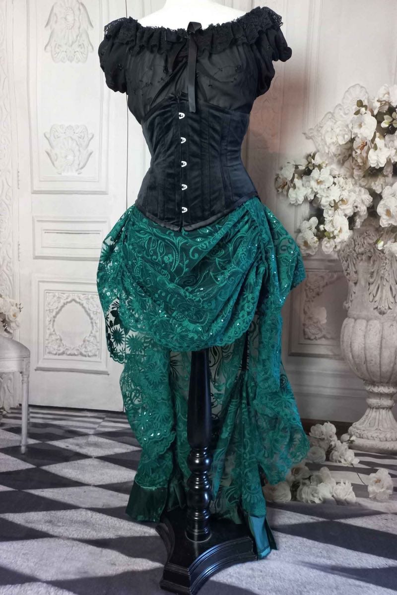 green lace victorian bustle skirt worn with a black velvet under bust corset from Gallery Serpentine