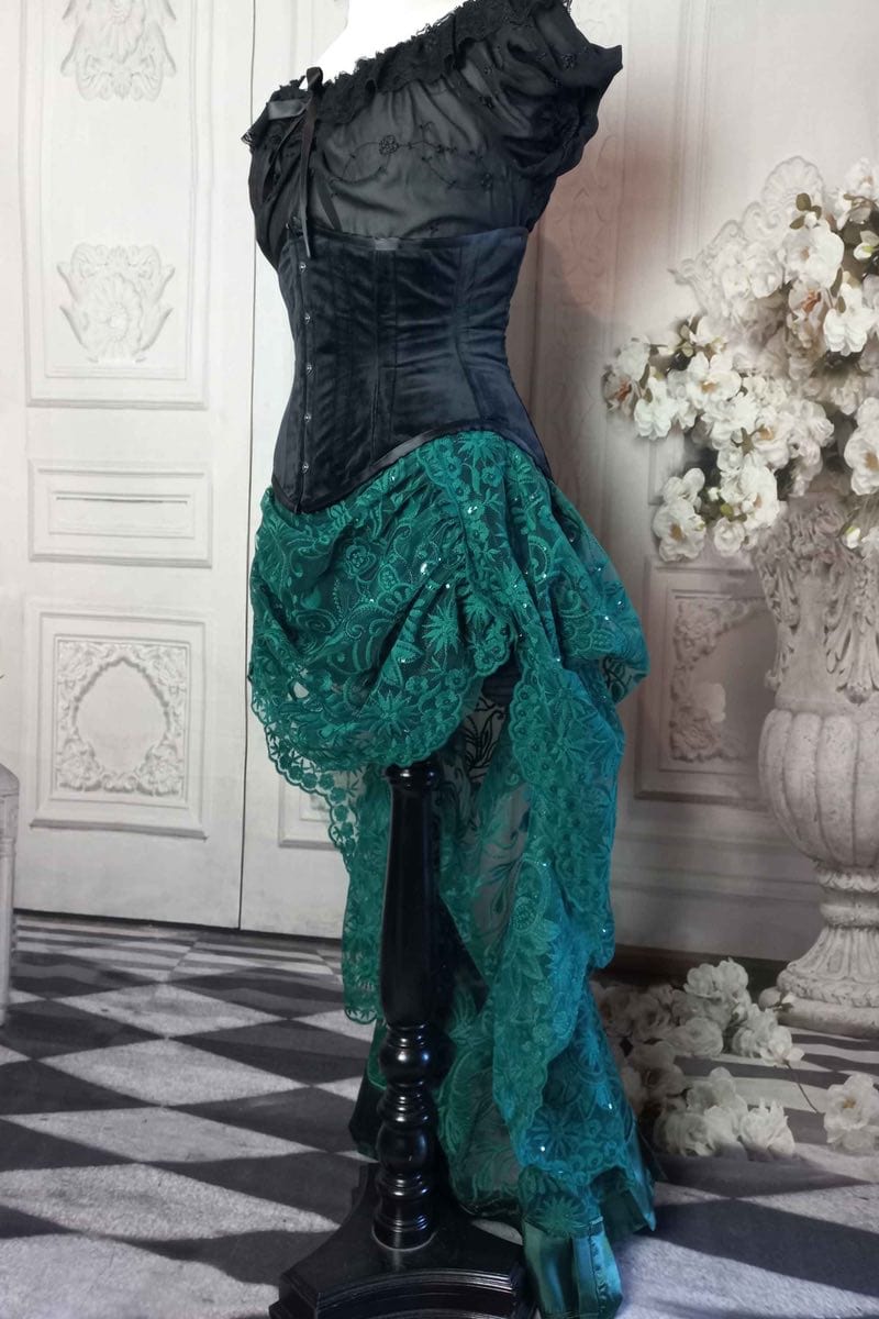 high low green lace victorian bustle skirt worn with a black velvet under bust corset from Gallery Serpentine