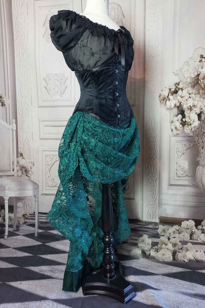 green lace victorian bustle skirt worn with a black velvet under bust corset from Gallery Serpentine 1