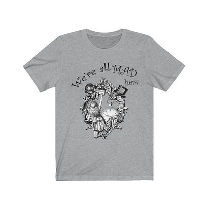 We're All Mad Here quote t-shirt from Alice in Wonderland on flat lay grey t-shirt
