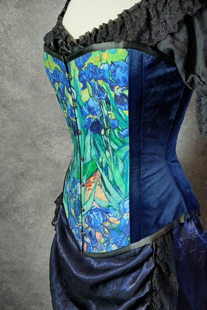 side front view of the van gogh irises print on an over bust corset made in Australia showing dark rich blue velvet side panels