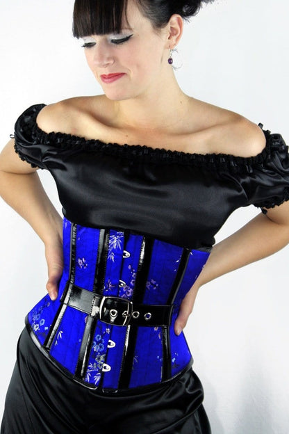 worn with an under corset chemise in satin is the Oriental Blue Avenger under bust steel boned Gallery Serpentine made corset from Australia, gothic and fetish detailing